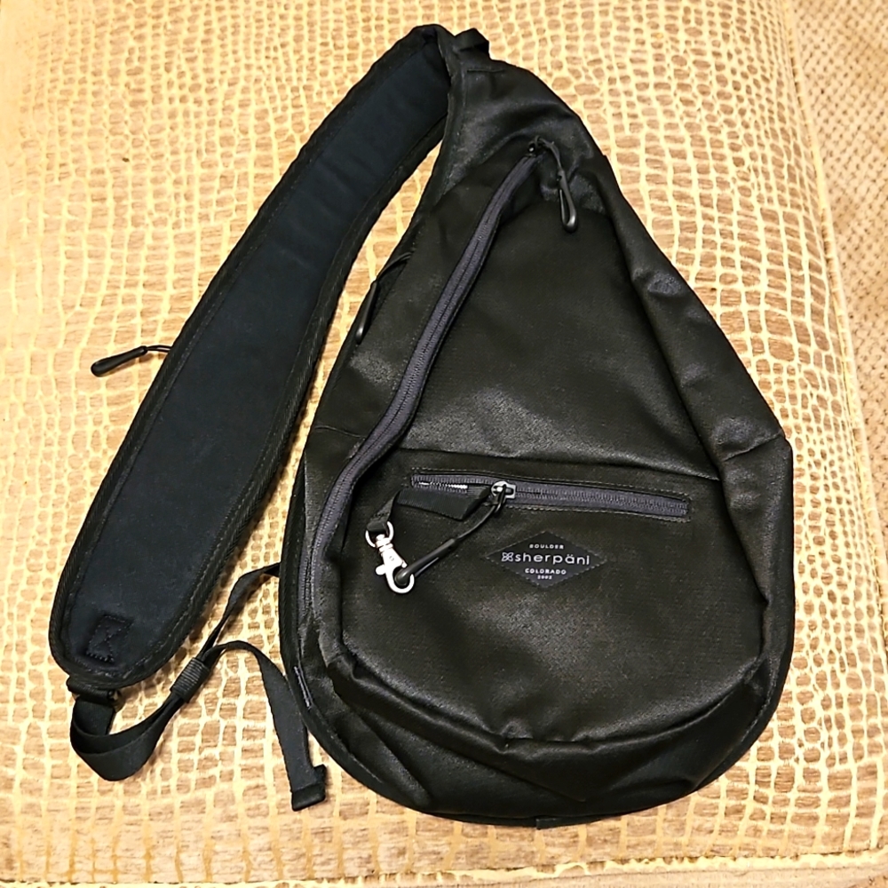 Sherpani anti theft ladies backpack.